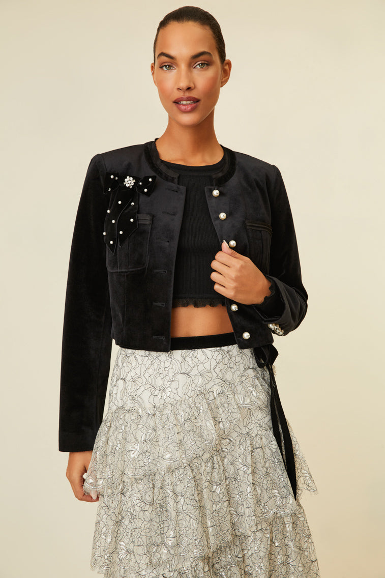 Luxe velvet cropped jacket that features pearl buttons with crystal embellishments.