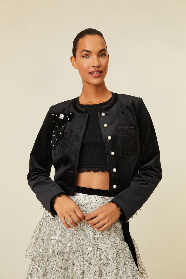 Luxe velvet cropped jacket that features pearl buttons with crystal embellishments.