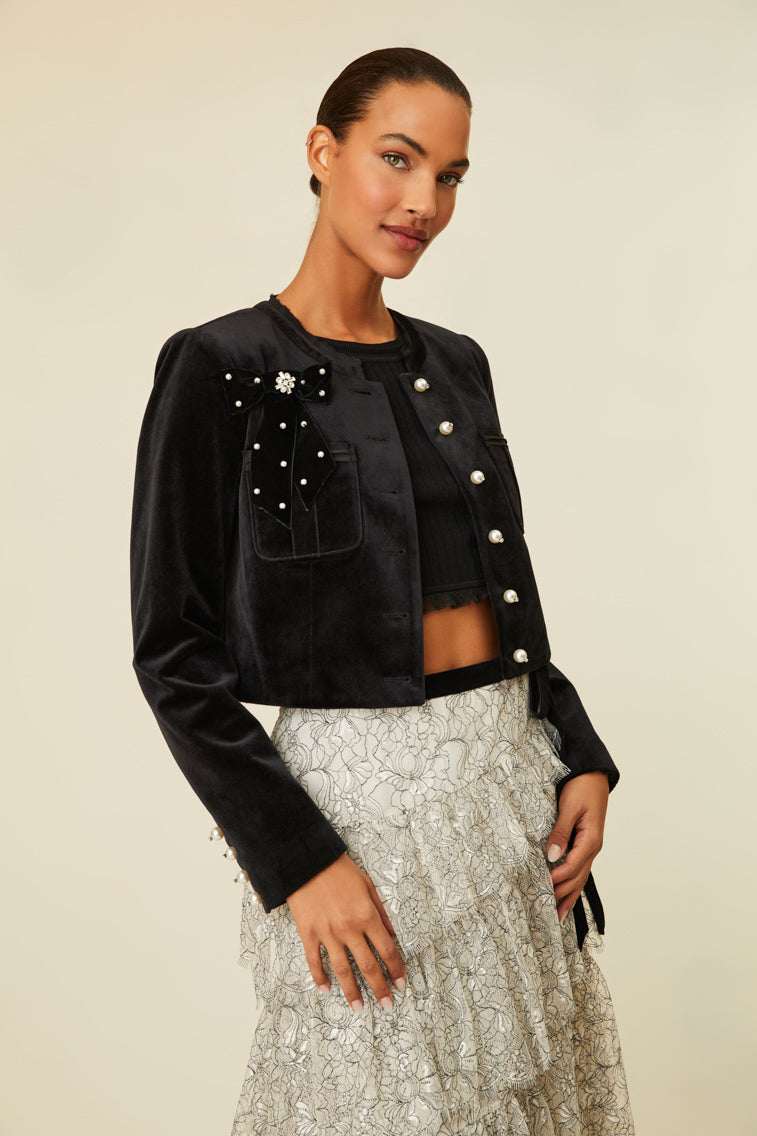 Luxe velvet cropped jacket that features pearl buttons with crystal embellishments.