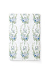 vintage-inspired repeating floral print bath towel in a soft blue against a white back