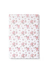 vintage-inspired repeating floral print bath towel in a soft pink against a white back