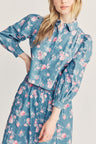 Women's faded denim cotton button down blouse with a vintage-inspired ditsy floral print