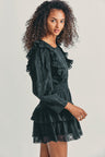 Women's black long sleeve mini dress with lace detail and tapered ruffle princess seam