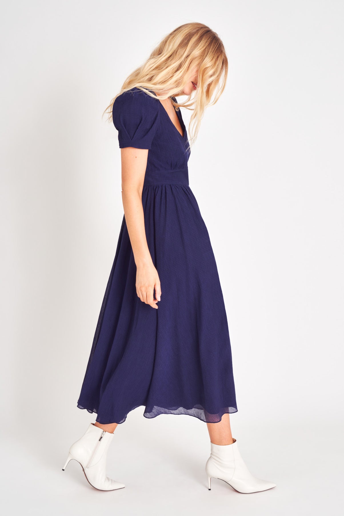 Puff sleeve v neck midi dress with fitted waist.