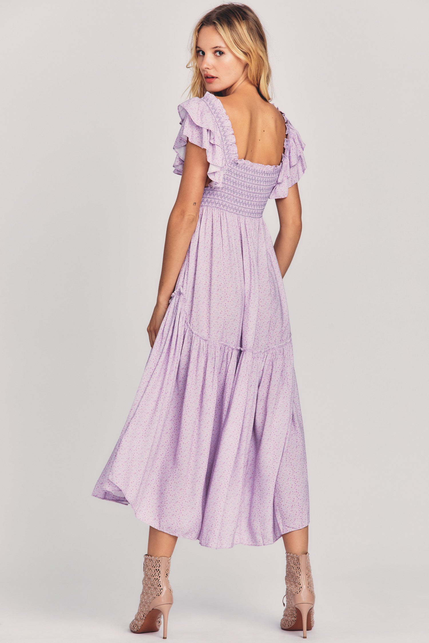 Women's purple maxi dress with all-over ditsy floral print and flutter sleeves