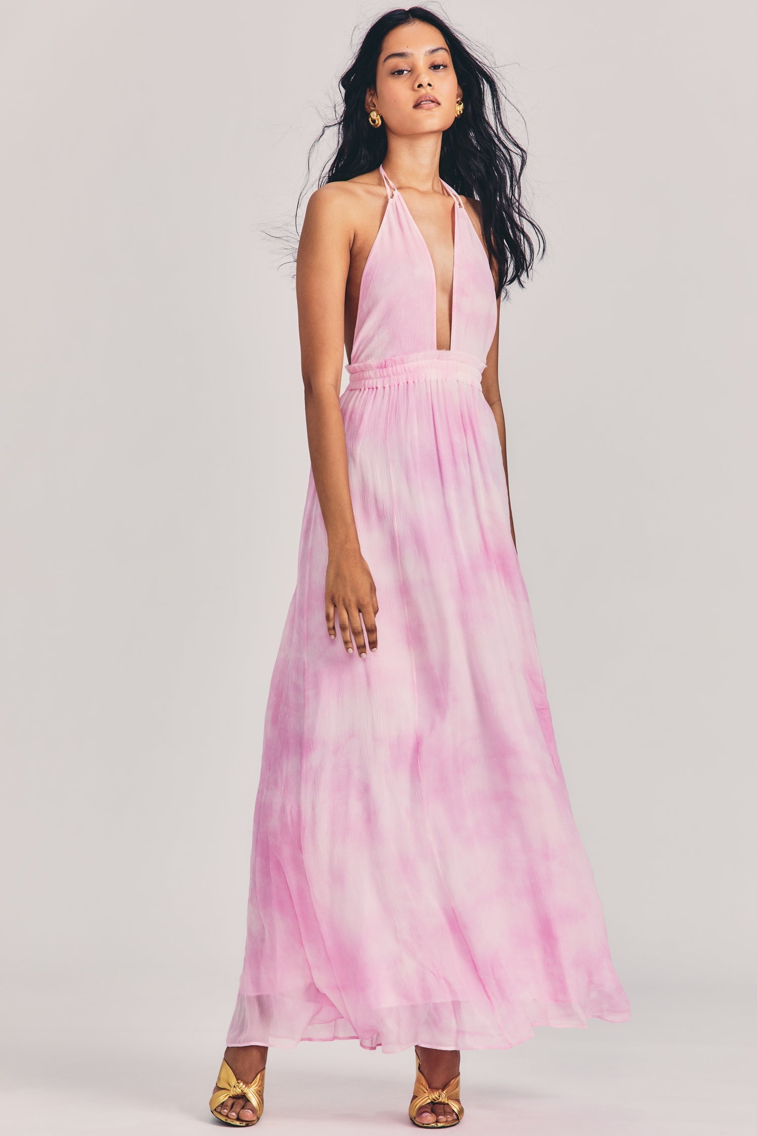 Women's pink tie-dye maxi dress with halter neck and plunging neckline