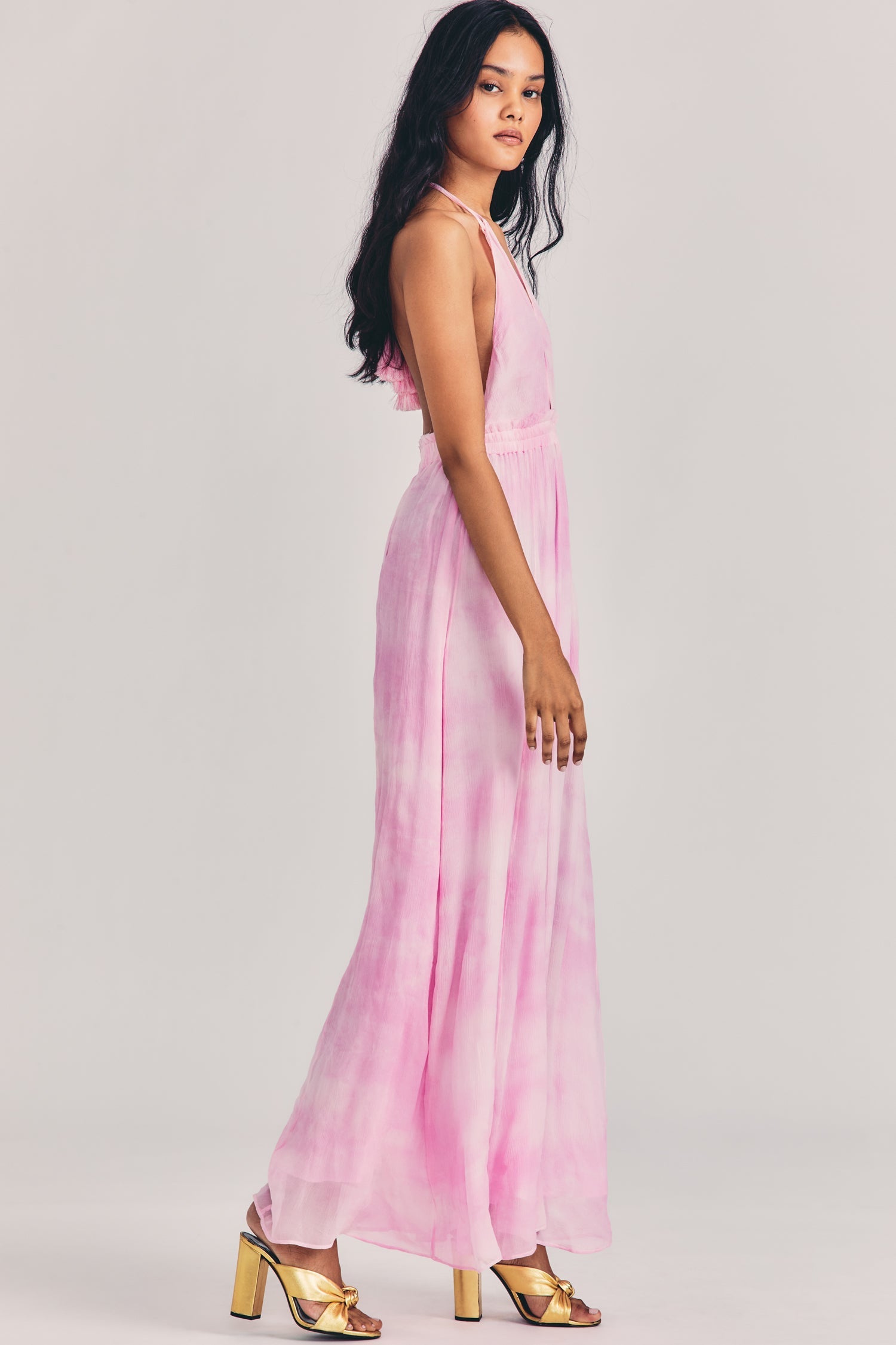 Women's pink tie-dye maxi dress with halter neck and plunging neckline