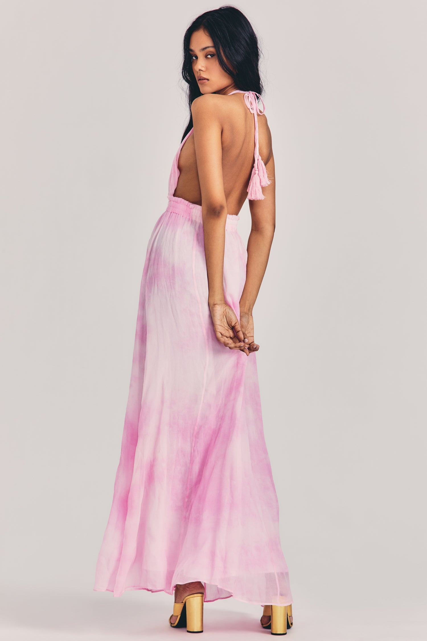 Women's pink tie-dye maxi dress with halter neck and plunging neckline