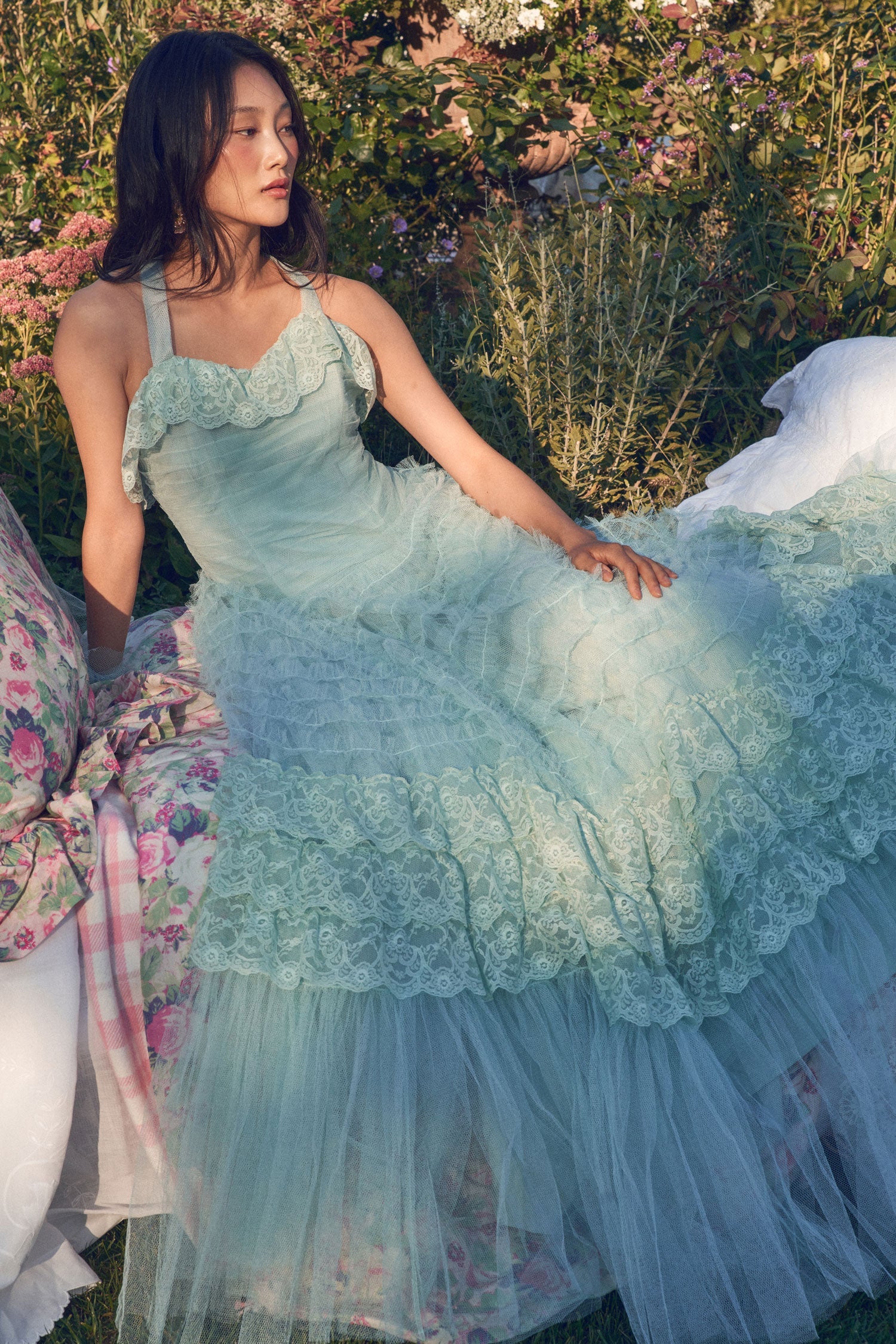 Women's blue tulle gown with pleated detailing