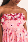 Women's pink viscose crepe dress with a tossed daisy print and handmade crushed velvet flower appliqués
