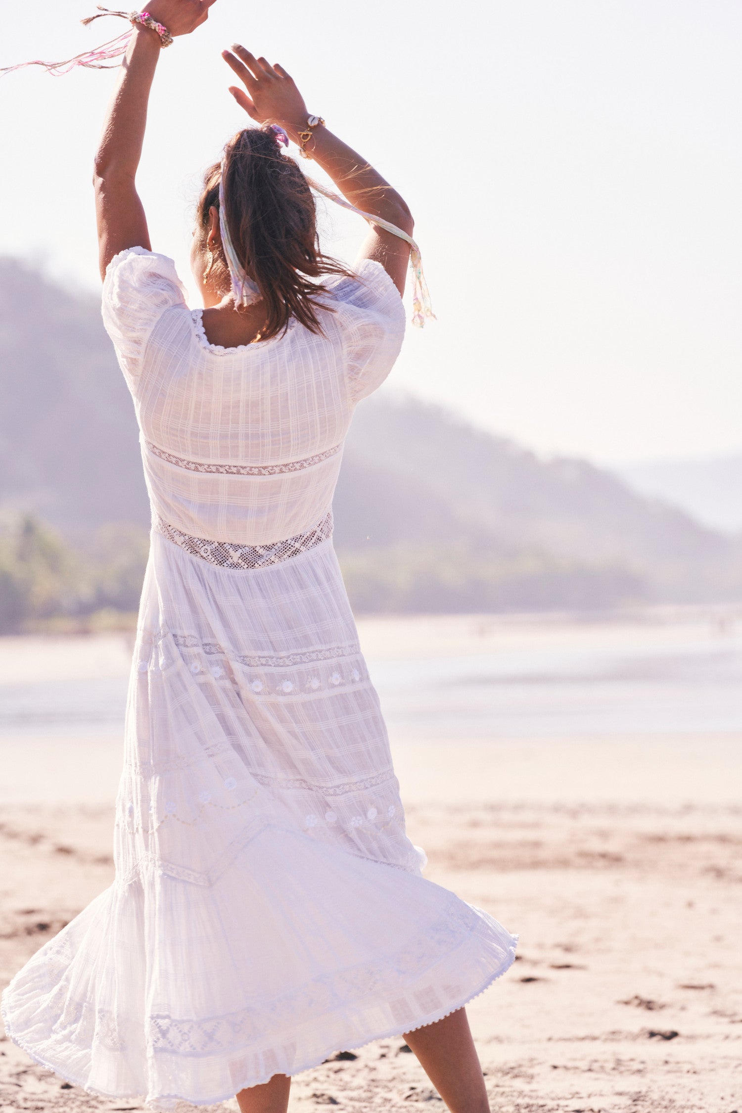 Women's white maxi dress with lace and embroidery detail