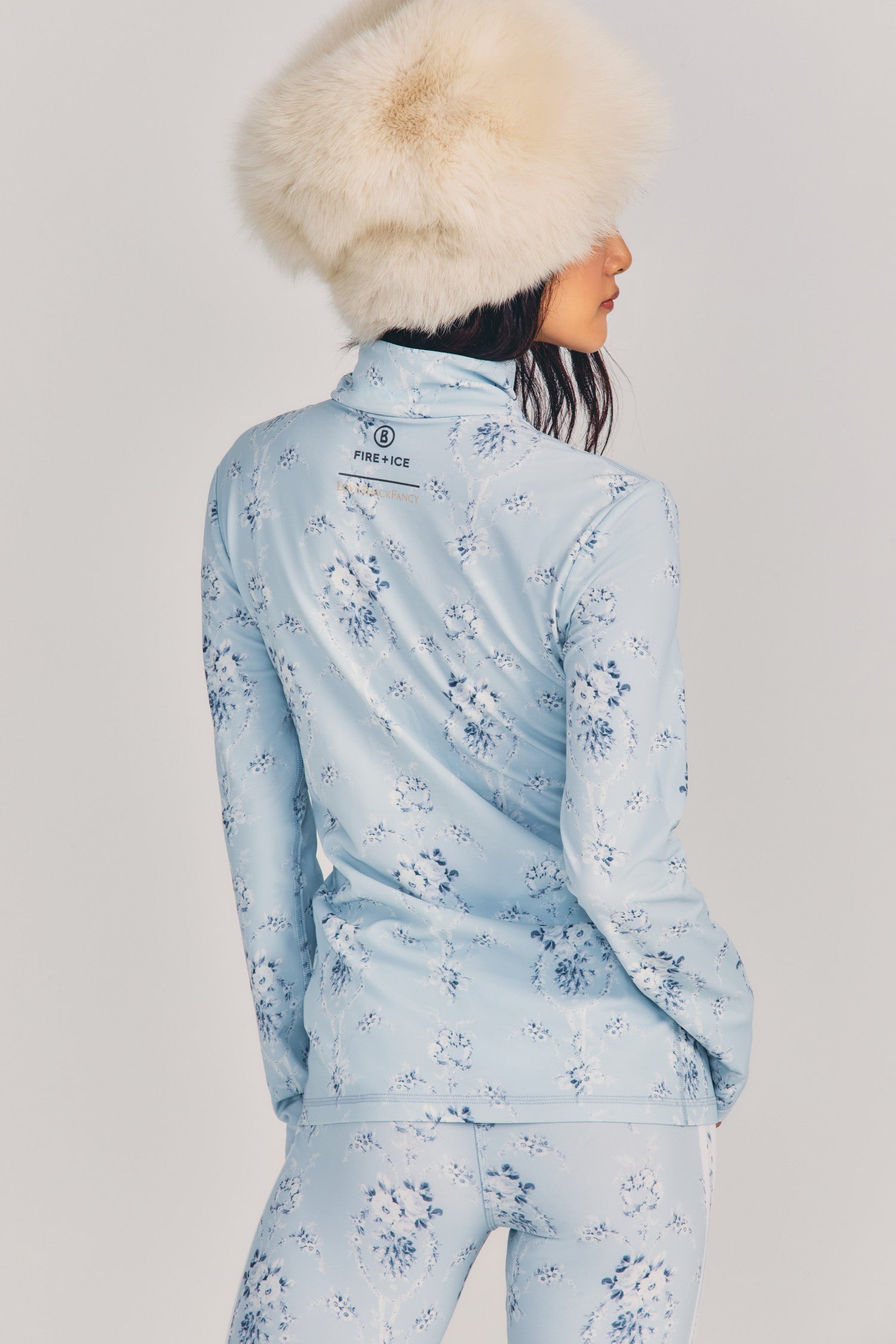 Womens blue floral printlong sleeve quarter zip ski shirt