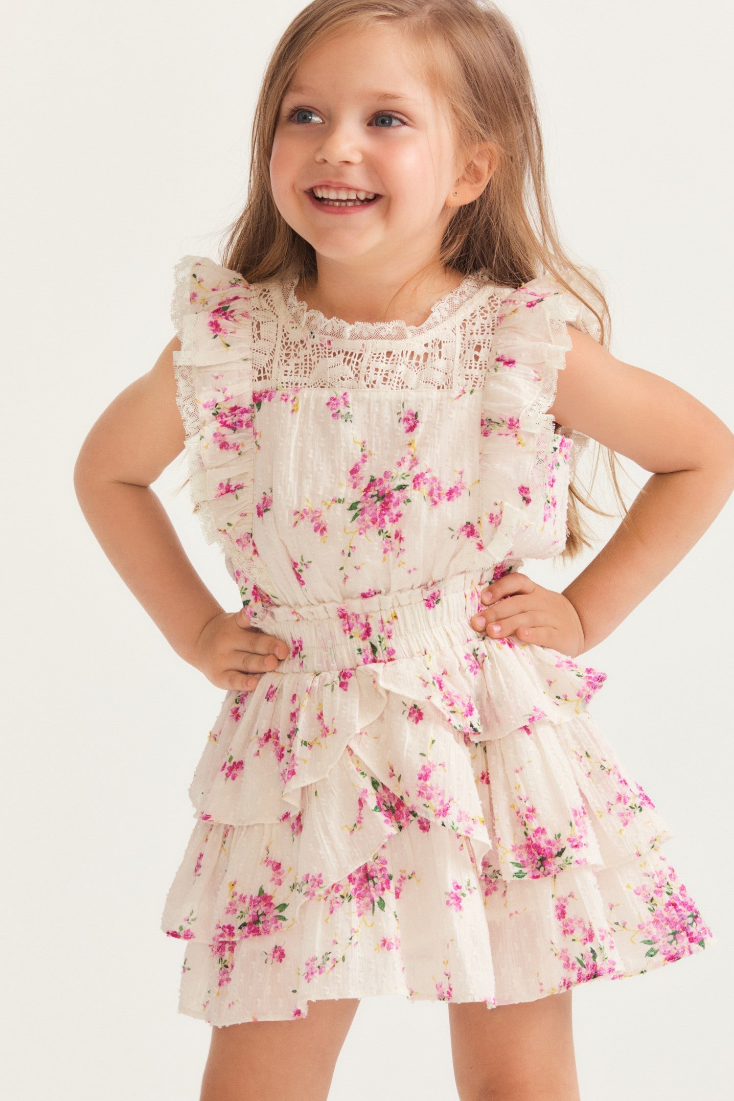 Girls magenta floral ruffle mini dress with flutter sleeve detail