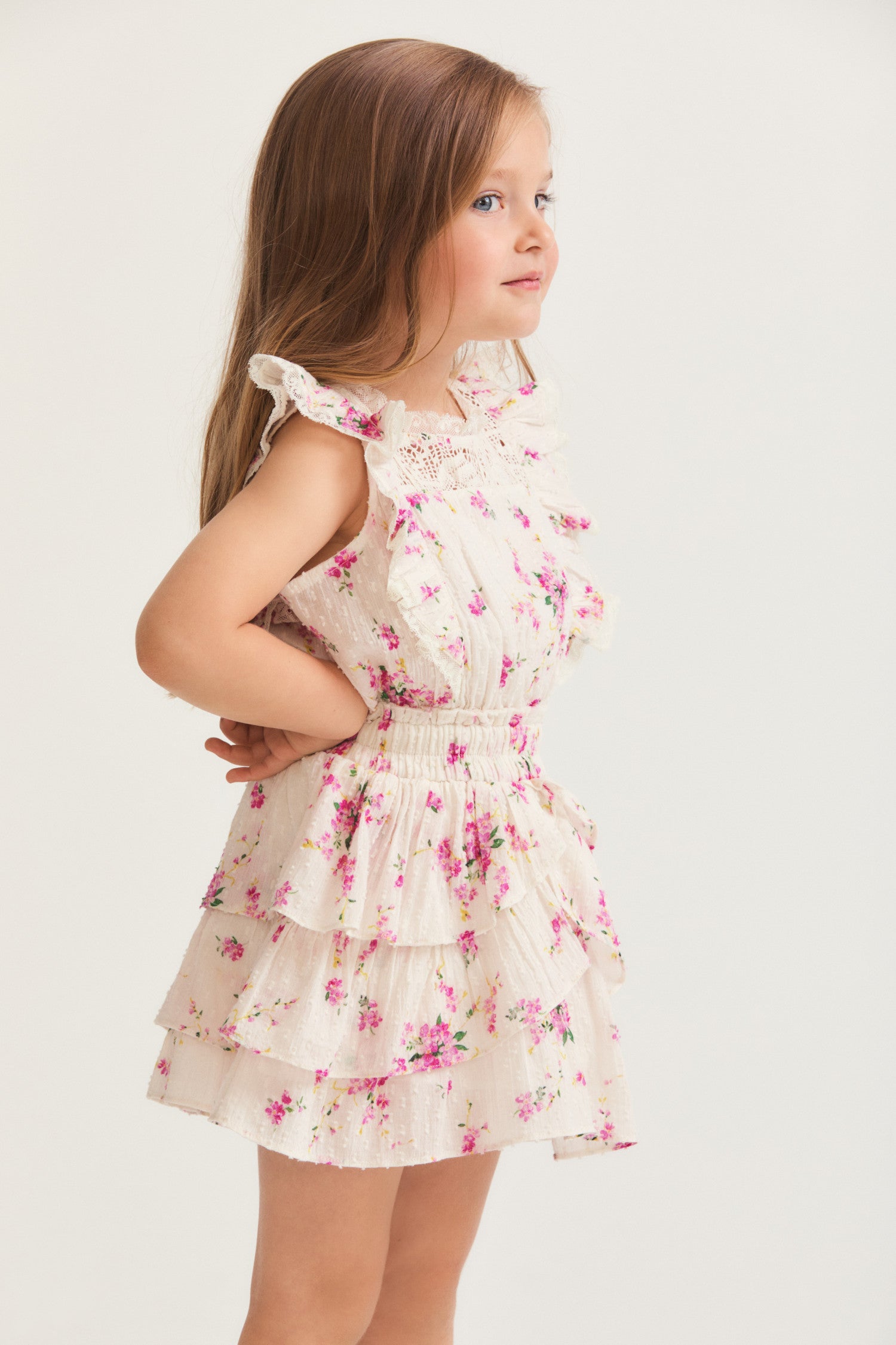 Girls magenta floral ruffle mini dress with flutter sleeve detail