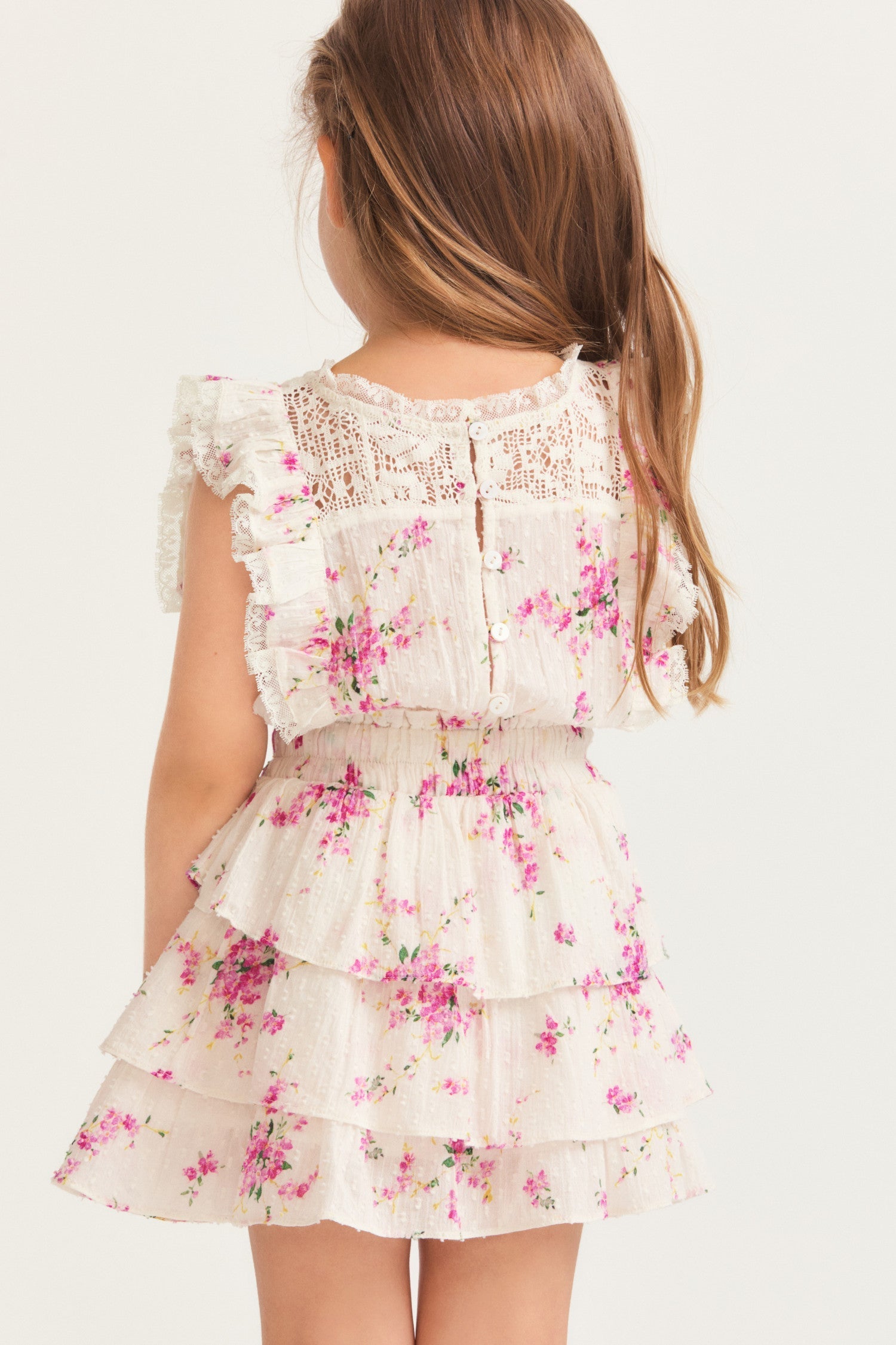 Girls magenta floral ruffle mini dress with flutter sleeve detail