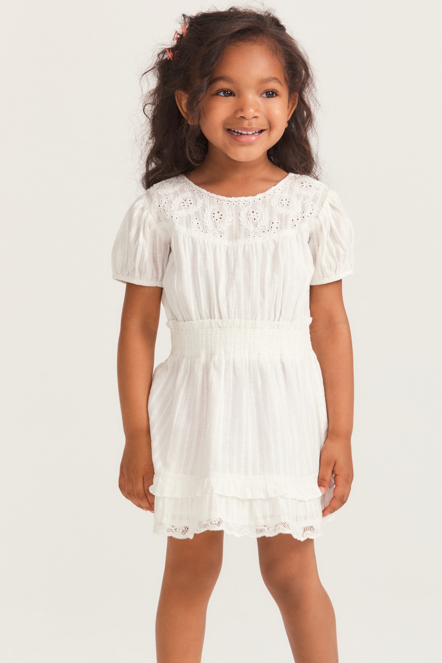 Girls white mini dress with custom embroidery and lace trim