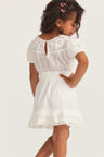 Girls white mini dress with custom embroidery and lace trim