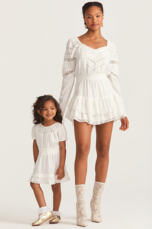 Girls white mini dress with custom embroidery and lace trim