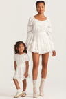 Girls white mini dress with custom embroidery and lace trim