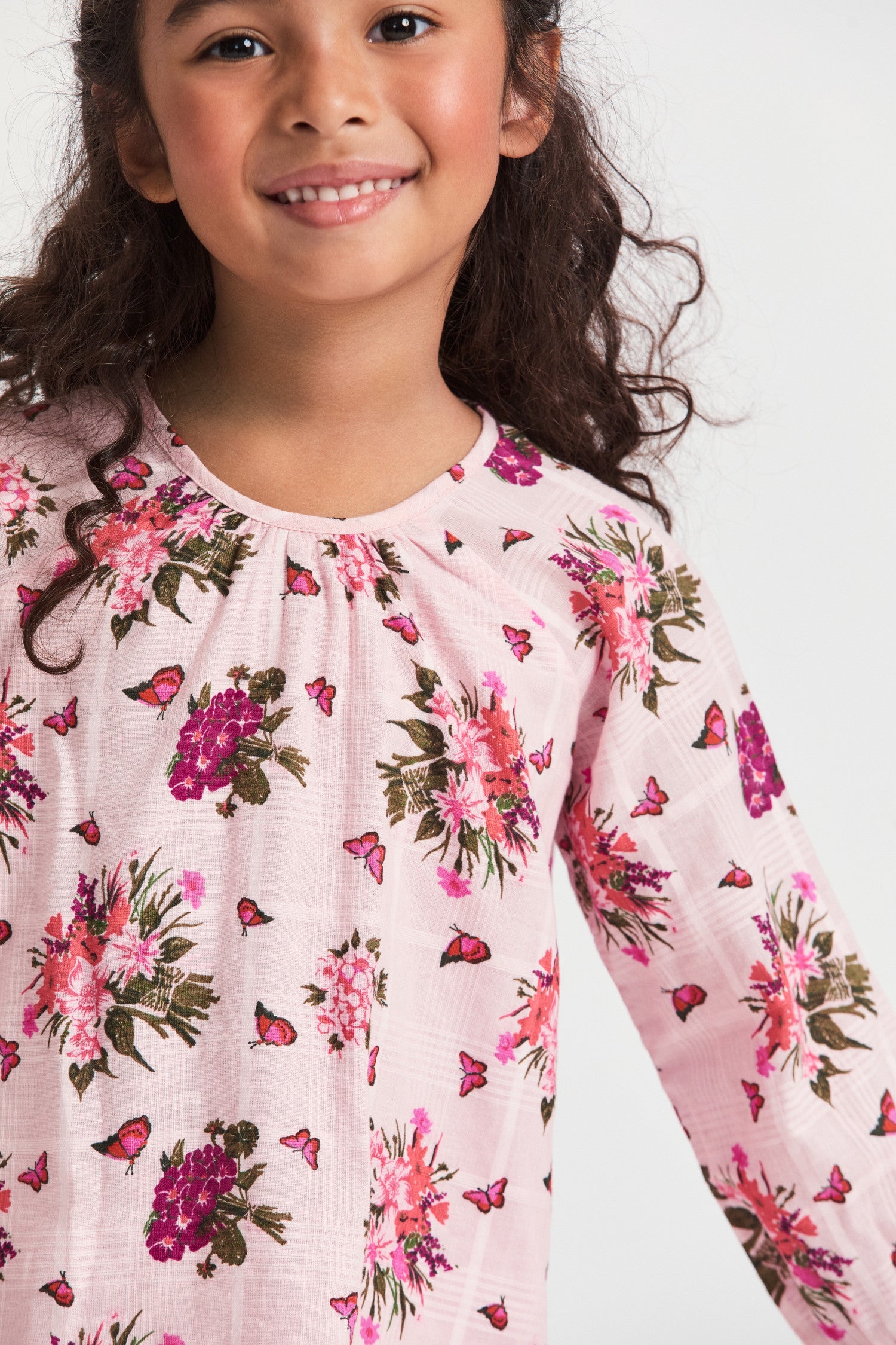 Girls floral pink print dress with long-sleeves.