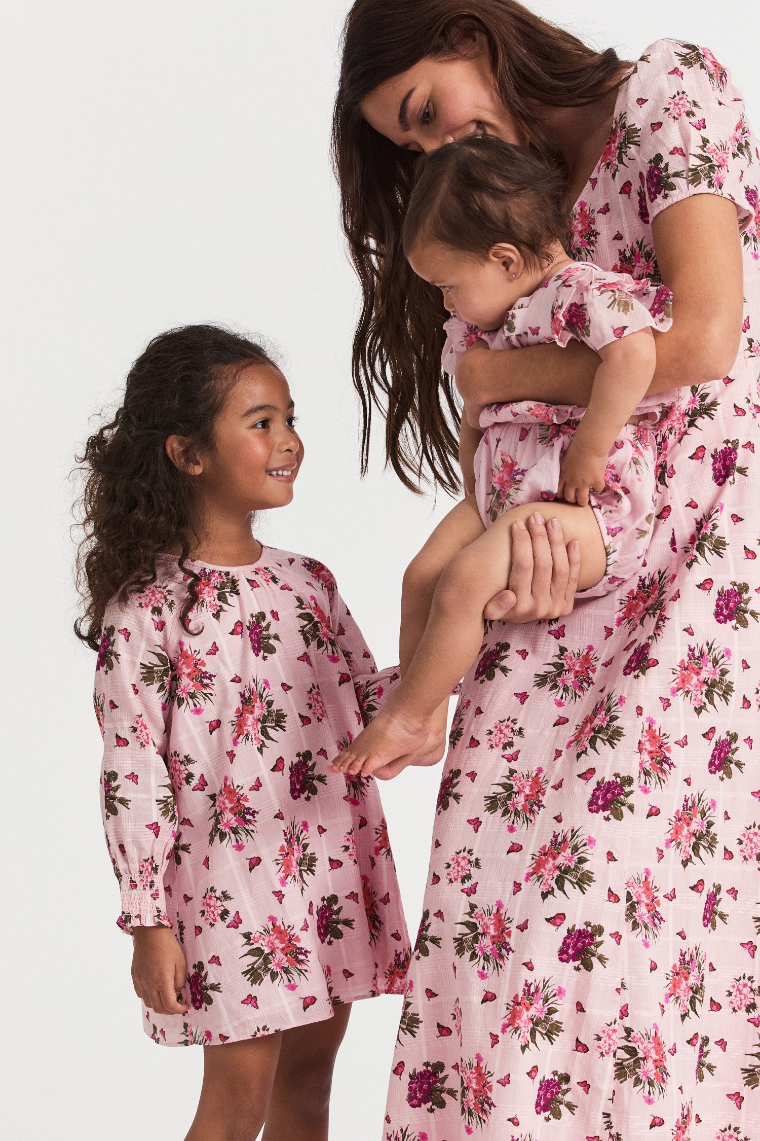 Girls floral pink print dress with long-sleeves.