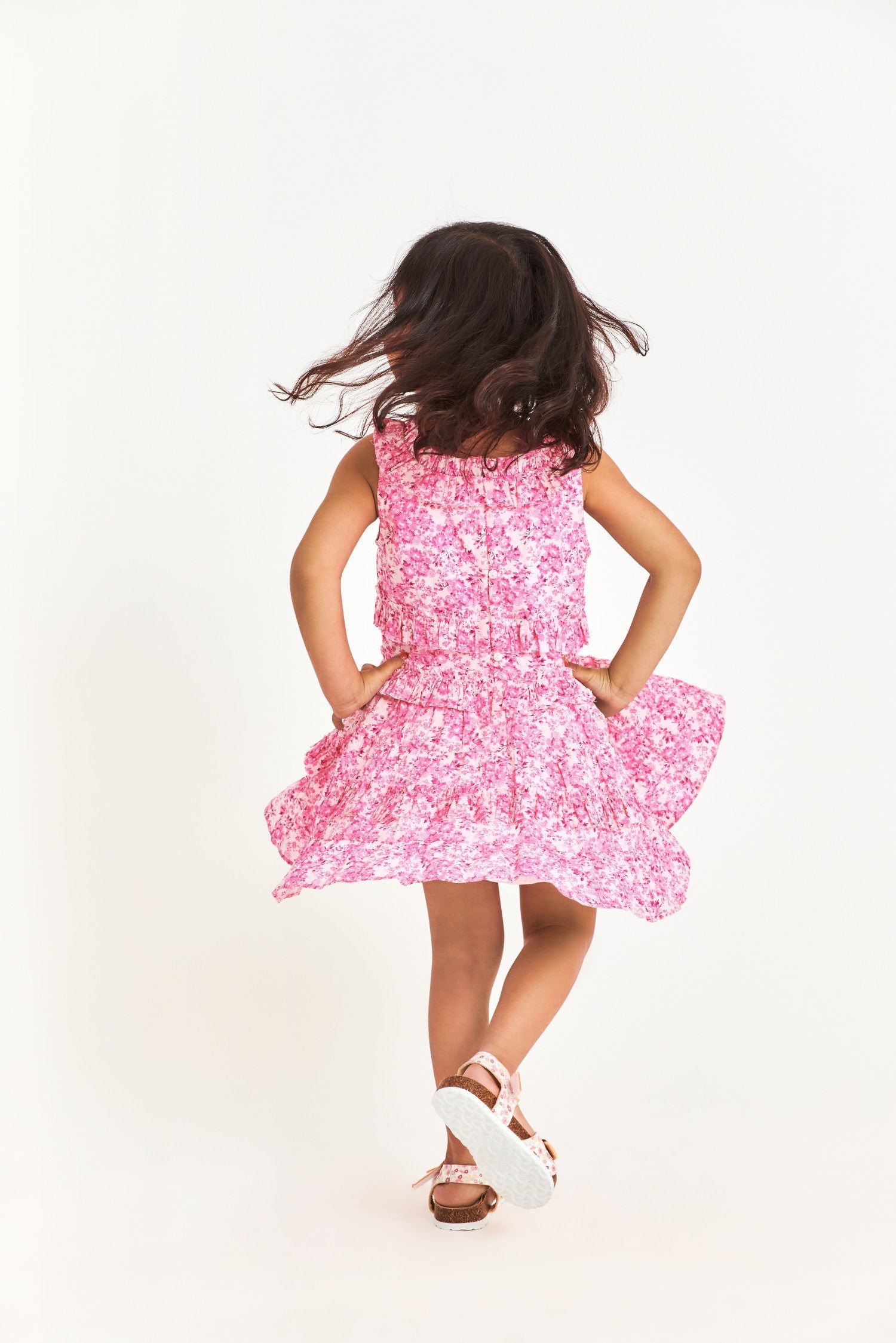 Pink floral kids top with ruffle details