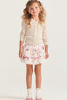 Girls ruffle mini skirt in magenta floral