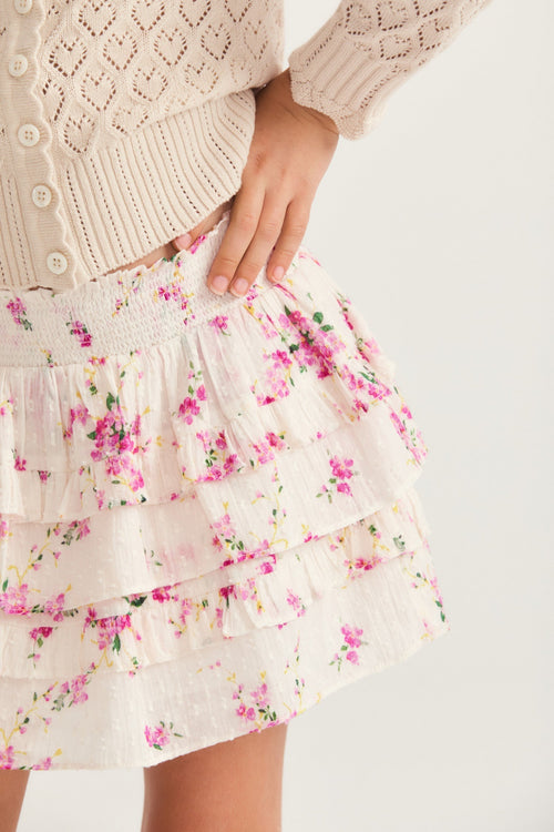 Girls ruffle mini skirt in magenta floral