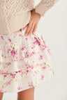 Girls ruffle mini skirt in magenta floral