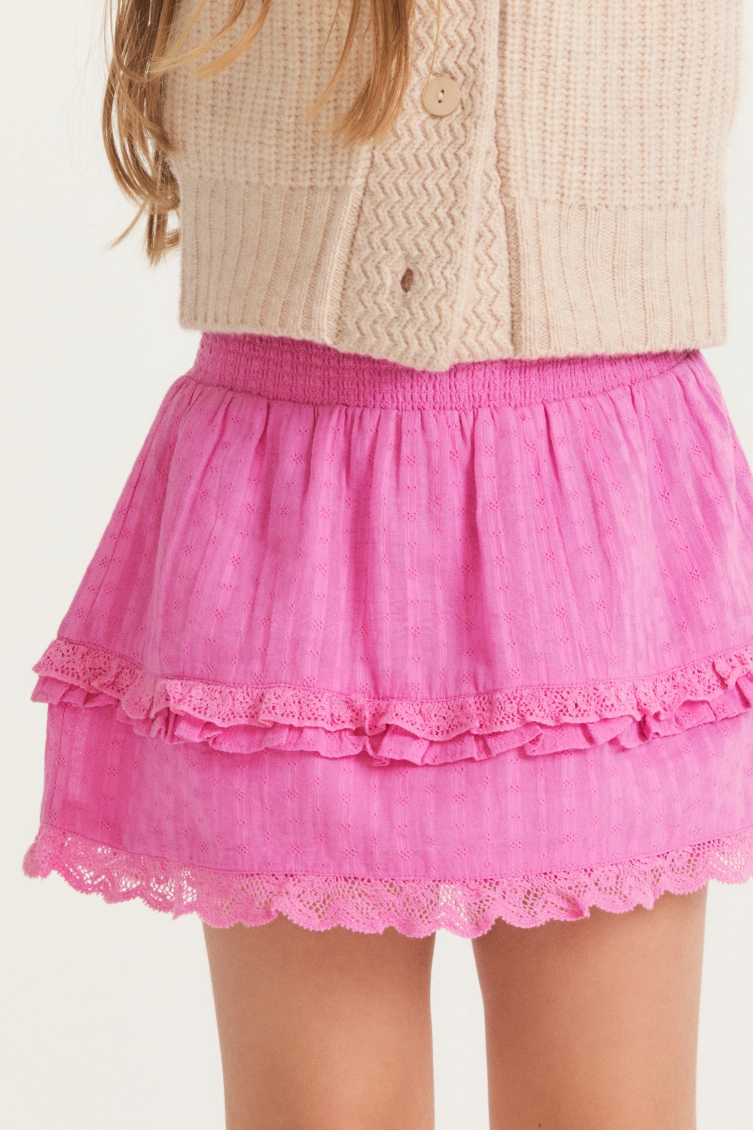 Girls pink ruffle mini skirt with lace trim