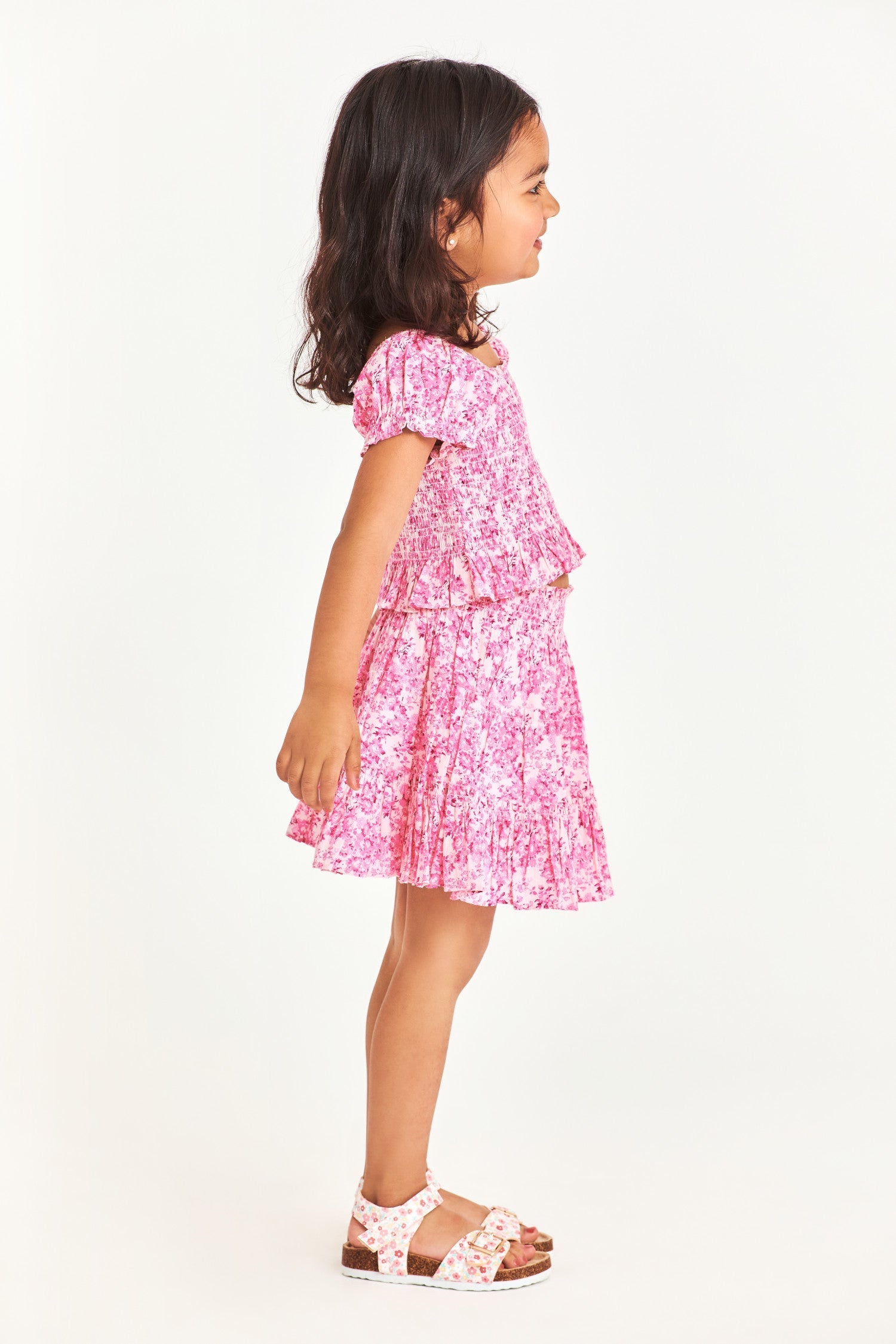 Pink smocked floral kids top with puff sleeves