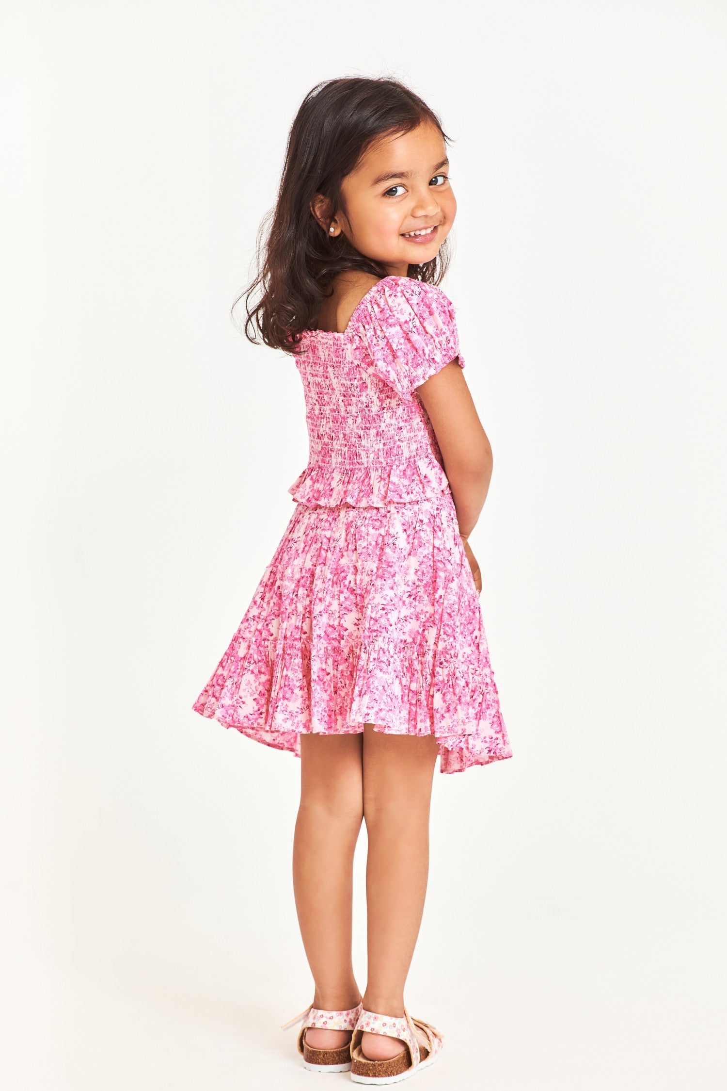 Pink smocked floral kids top with puff sleeves