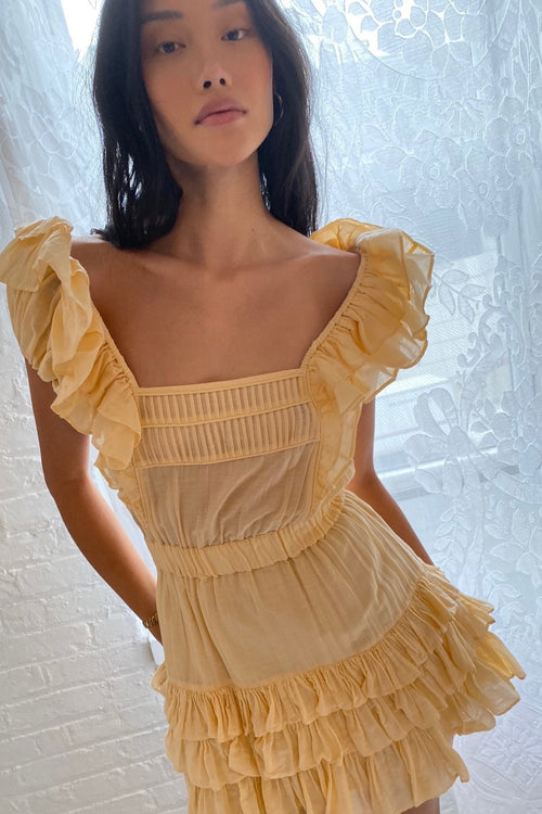 Women's orange mini dress with ruffle detail