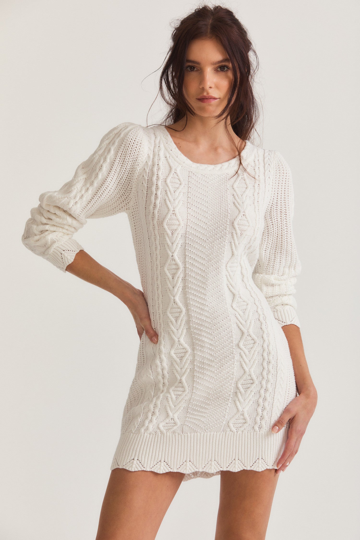 White long sleeved mini sweater dress with cord texture