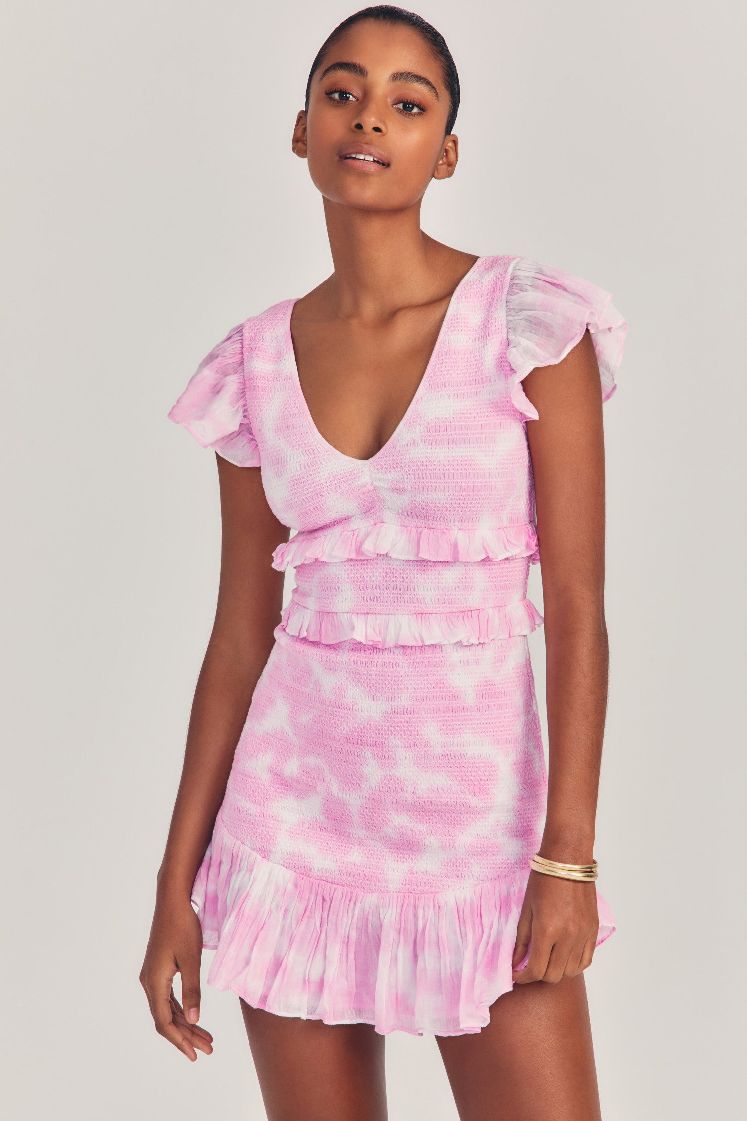 Womens pink hand tie-dyed v-neck mini dress with ruffle detailing and flutter sleeves