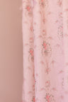 Designed from linen and cotton, its the perfect vintage-inspired shower curtain featuring a pink floral print across the back of a baby pink shower curtain. 