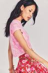 Womens pink hand tie-dyed cropped muscle tee with distressed edges