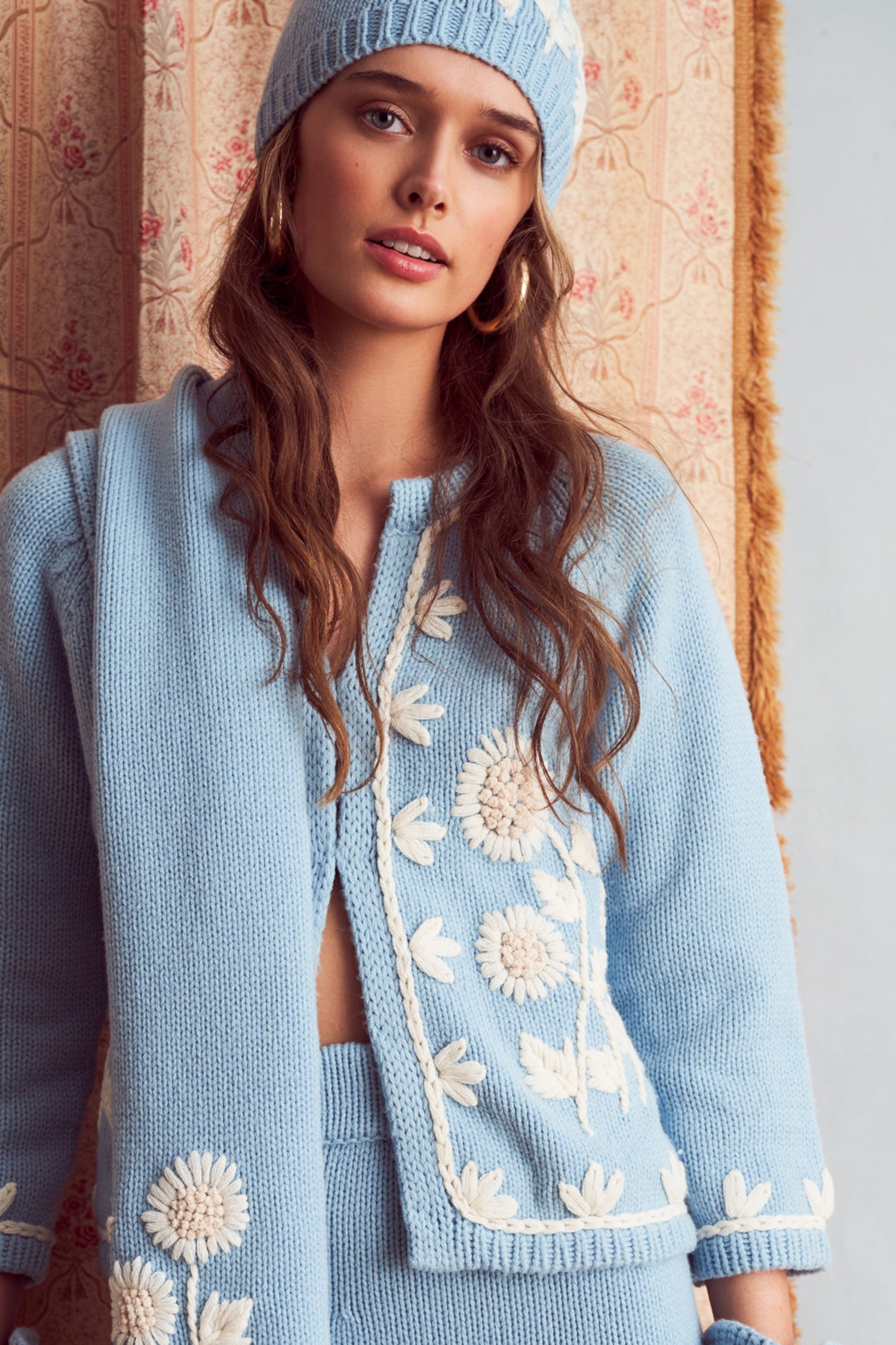 Women's blue cardigan with a hand-embroidered garden motif