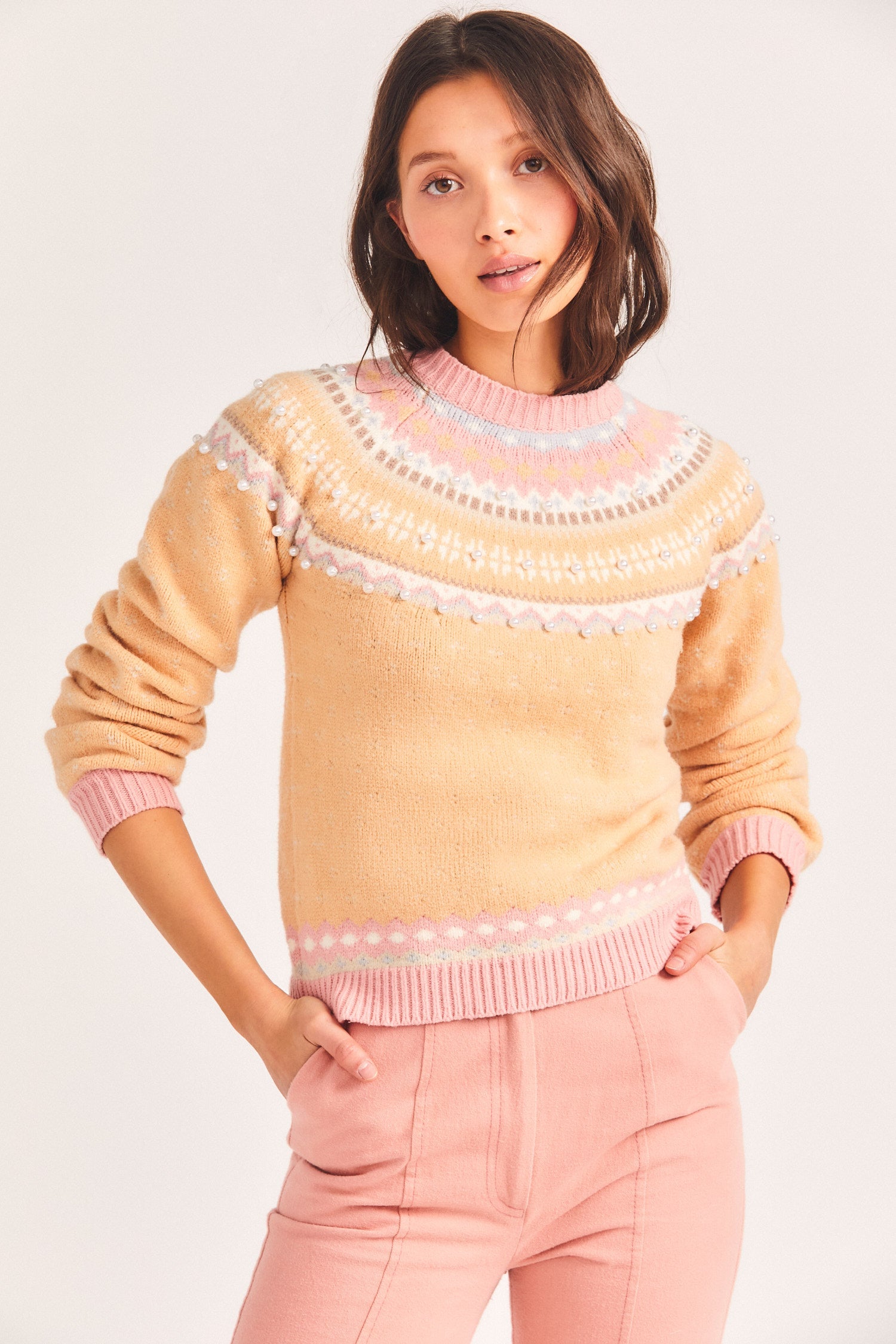 Women's orange and pink shrunken sweater with pearl details