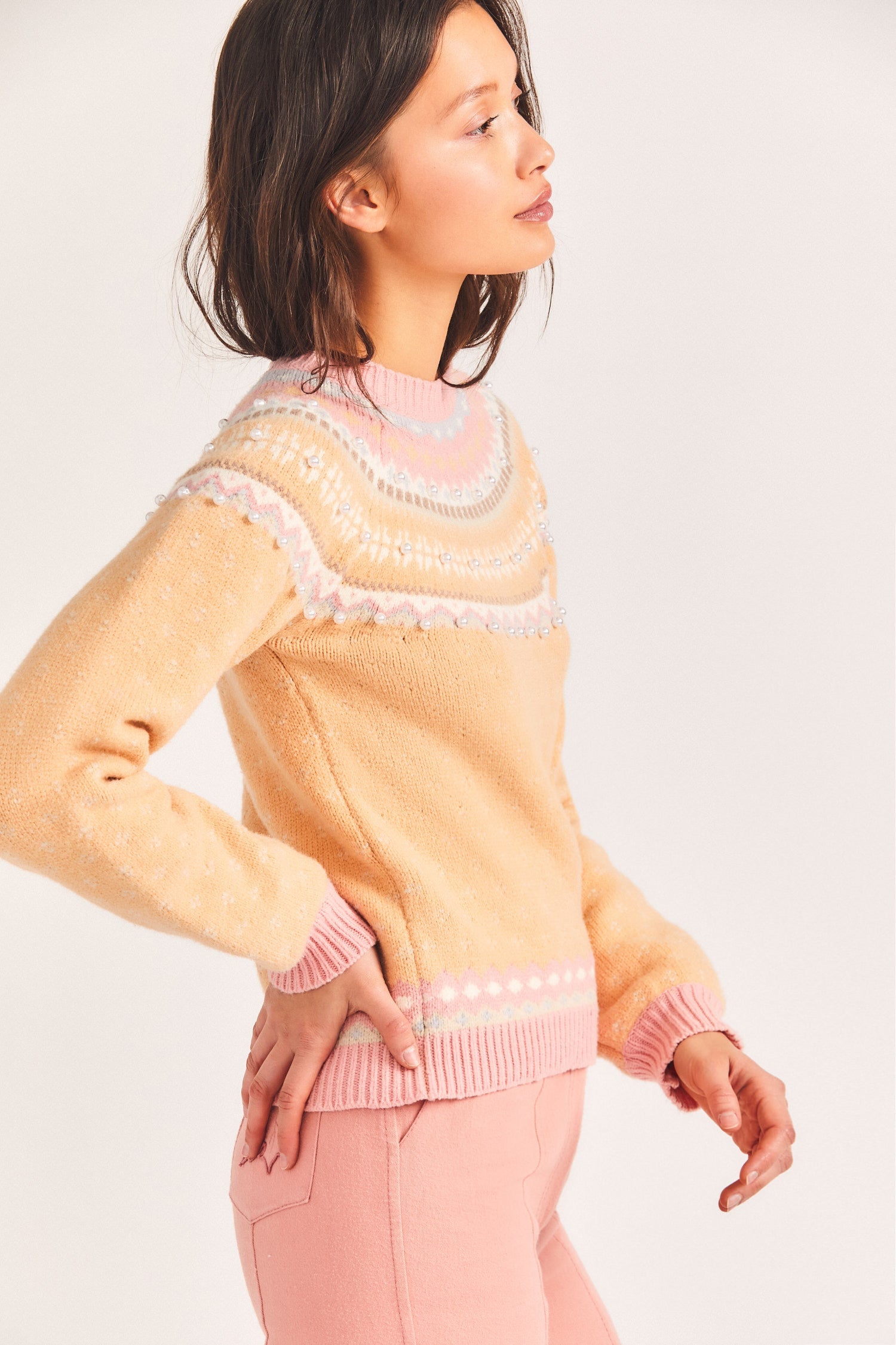 Women's orange and pink shrunken sweater with pearl details