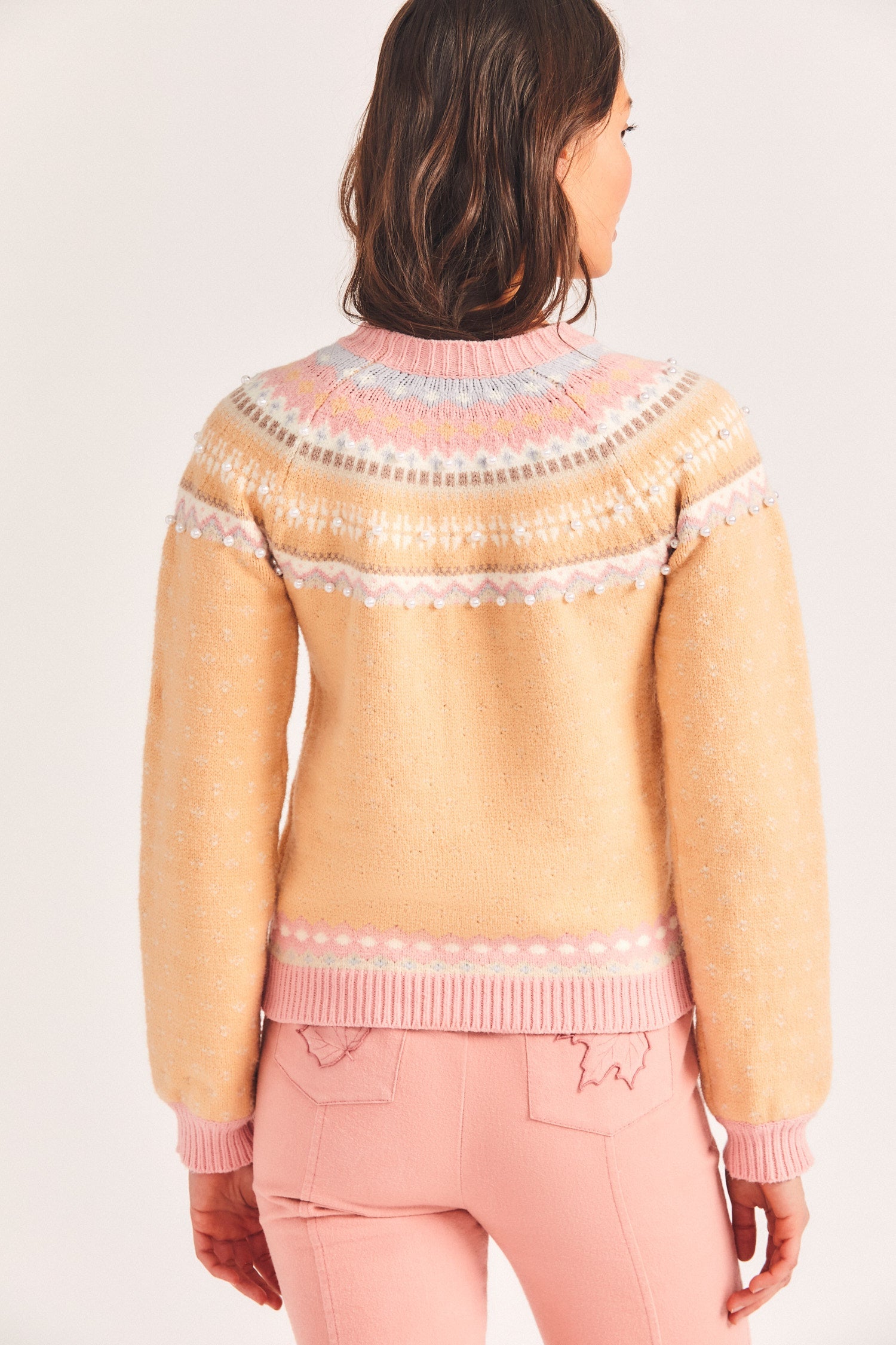 Women's orange and pink shrunken sweater with pearl details