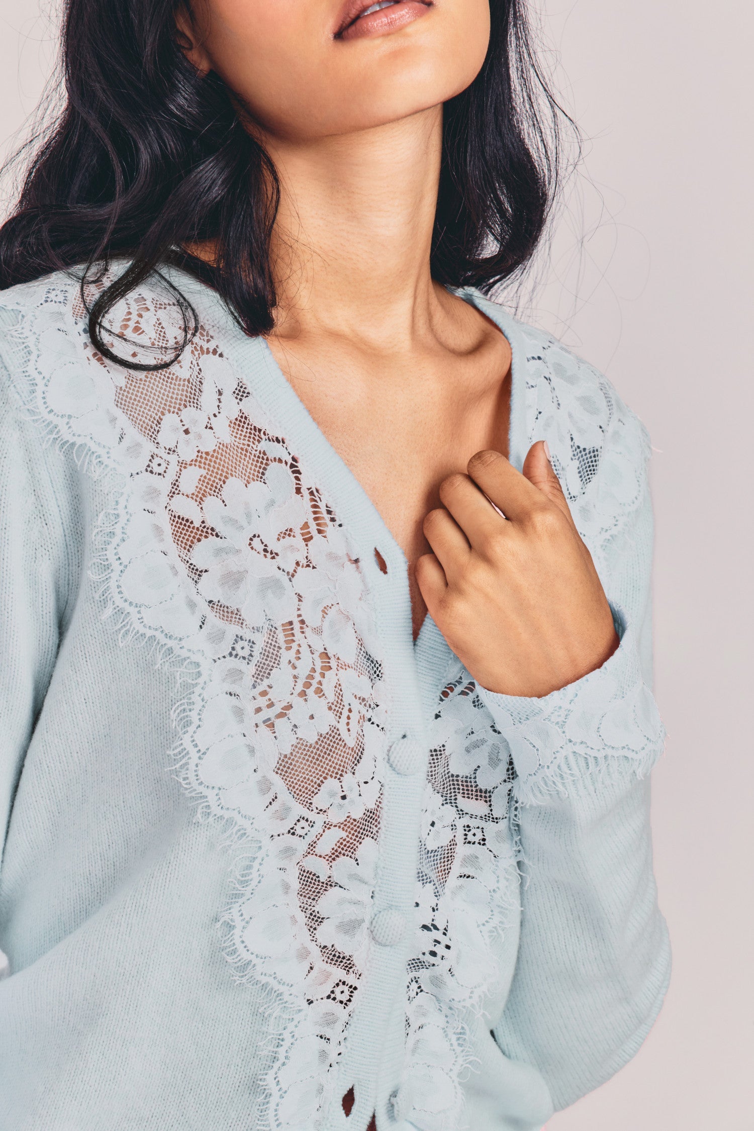 Womens vintage-inspired light blue cardigan with lace detailing down center