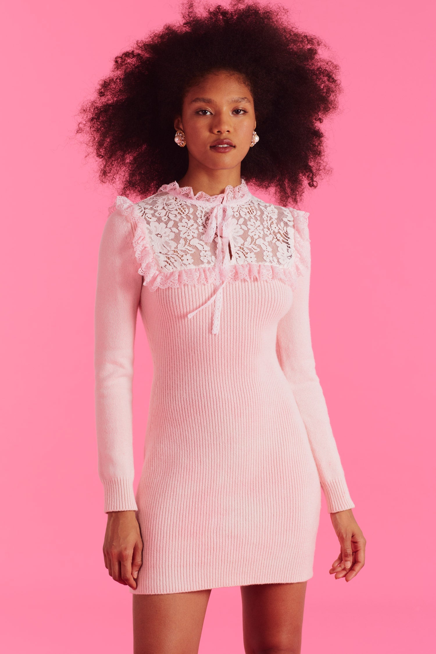 Womens light pink long sleeve mini dress with lace detailing and ties at top