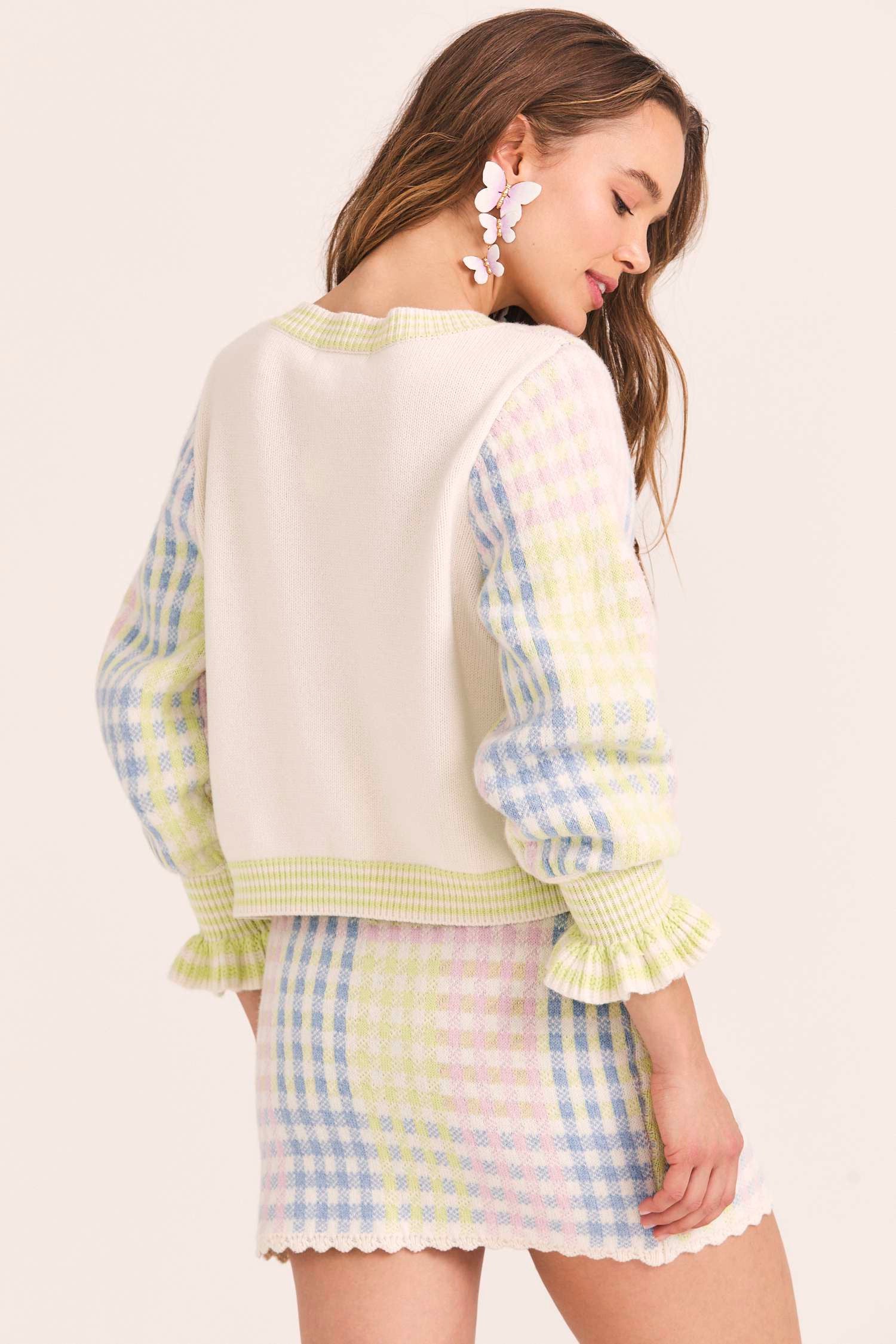 Women's button up sweater with multicolor check pattern 