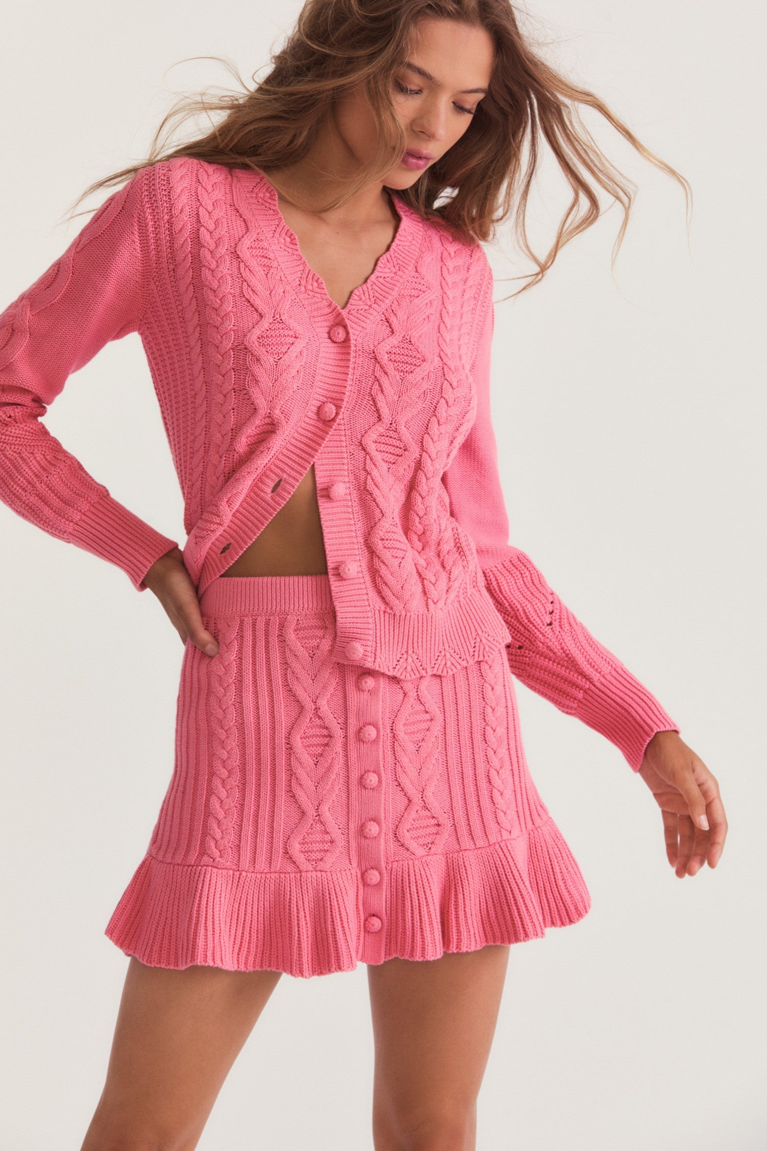 Pink button down mini skirt with texture