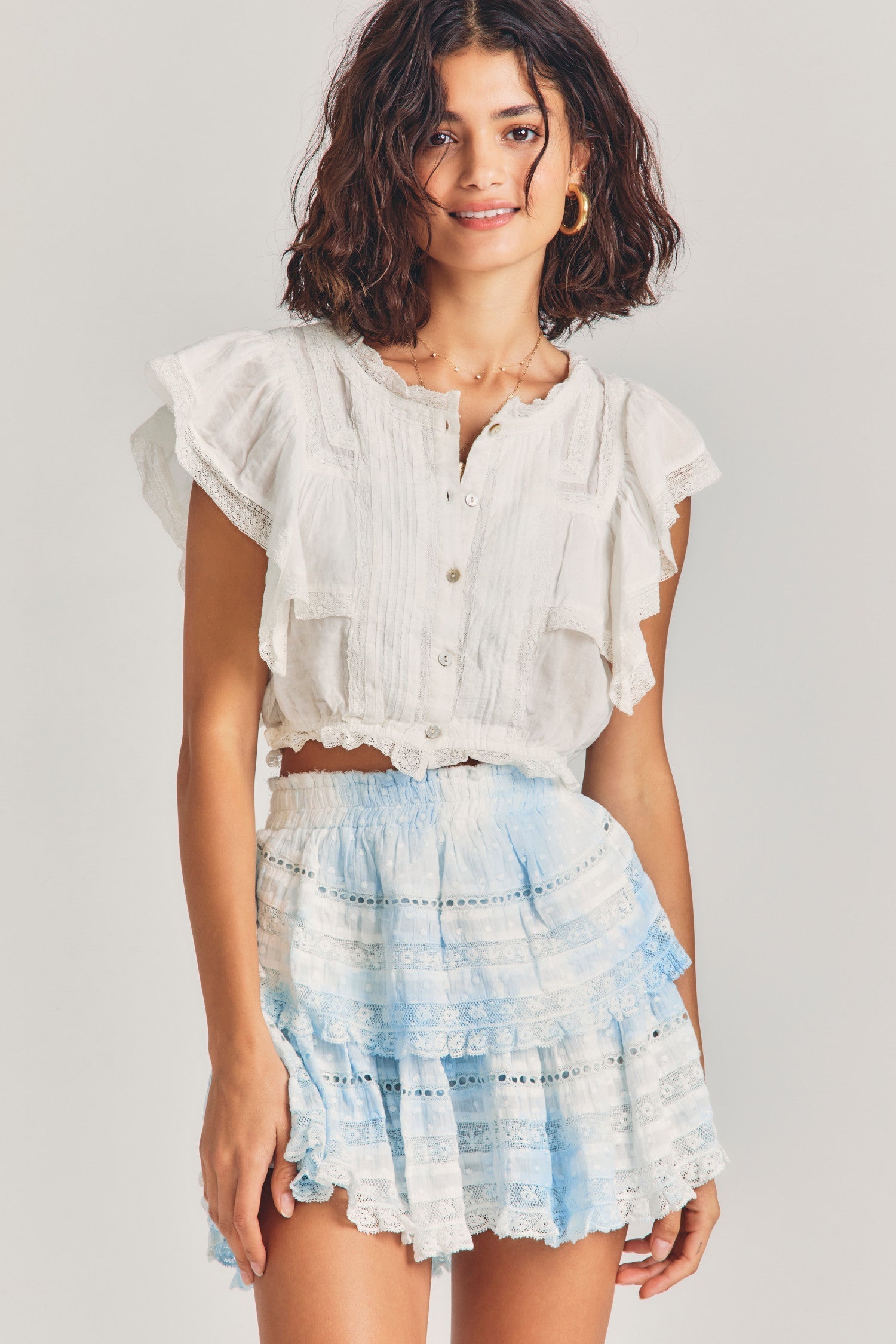 Light blue tie-dyed mini skirt with two tiers of ruffles