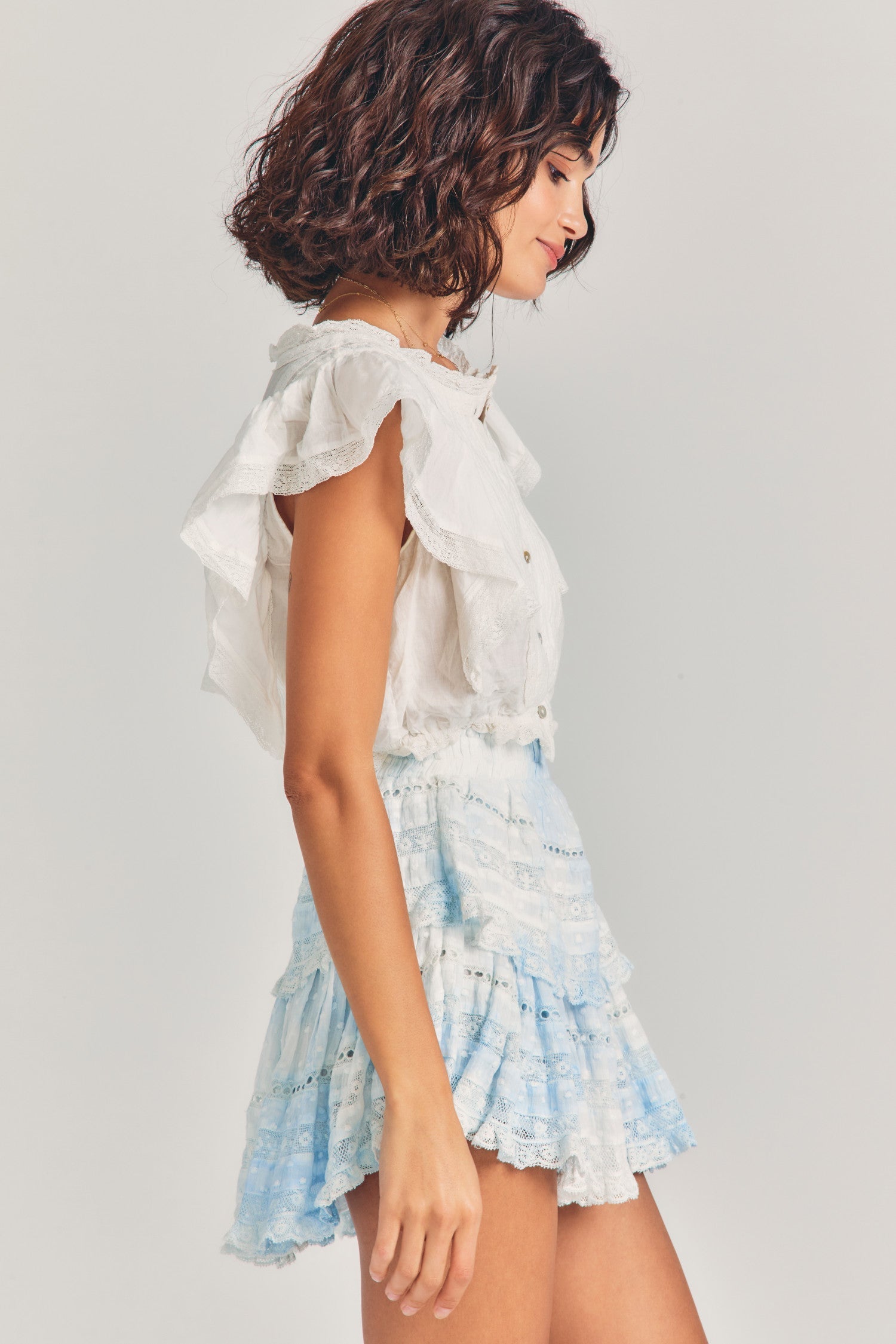 Light blue tie-dyed mini skirt with two tiers of ruffles