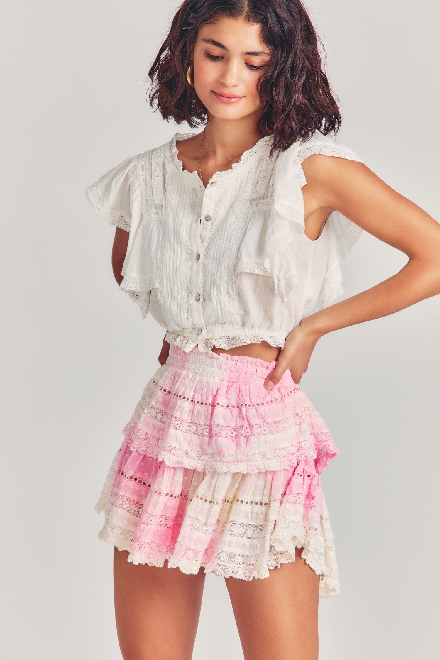 Pink tie-dyed mini skirt with two tiers of ruffles