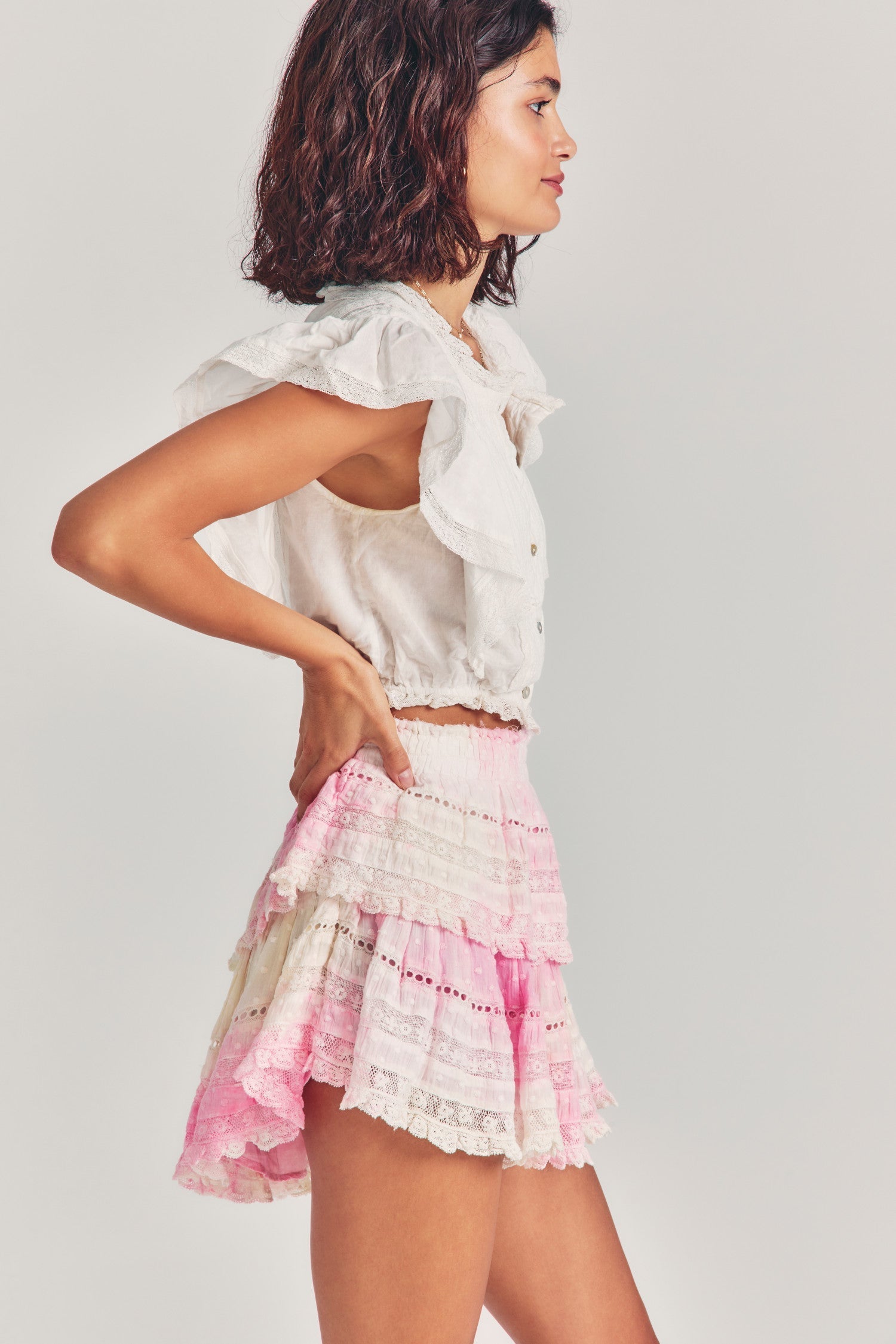 Pink tie-dyed mini skirt with two tiers of ruffles