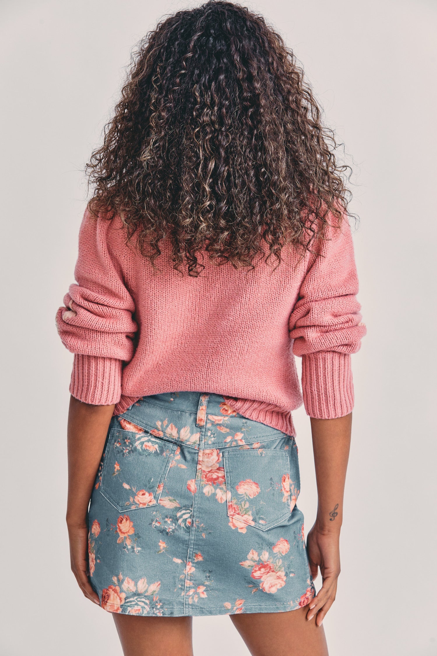 Women's blue corduroy denim mini skirt with carnation print